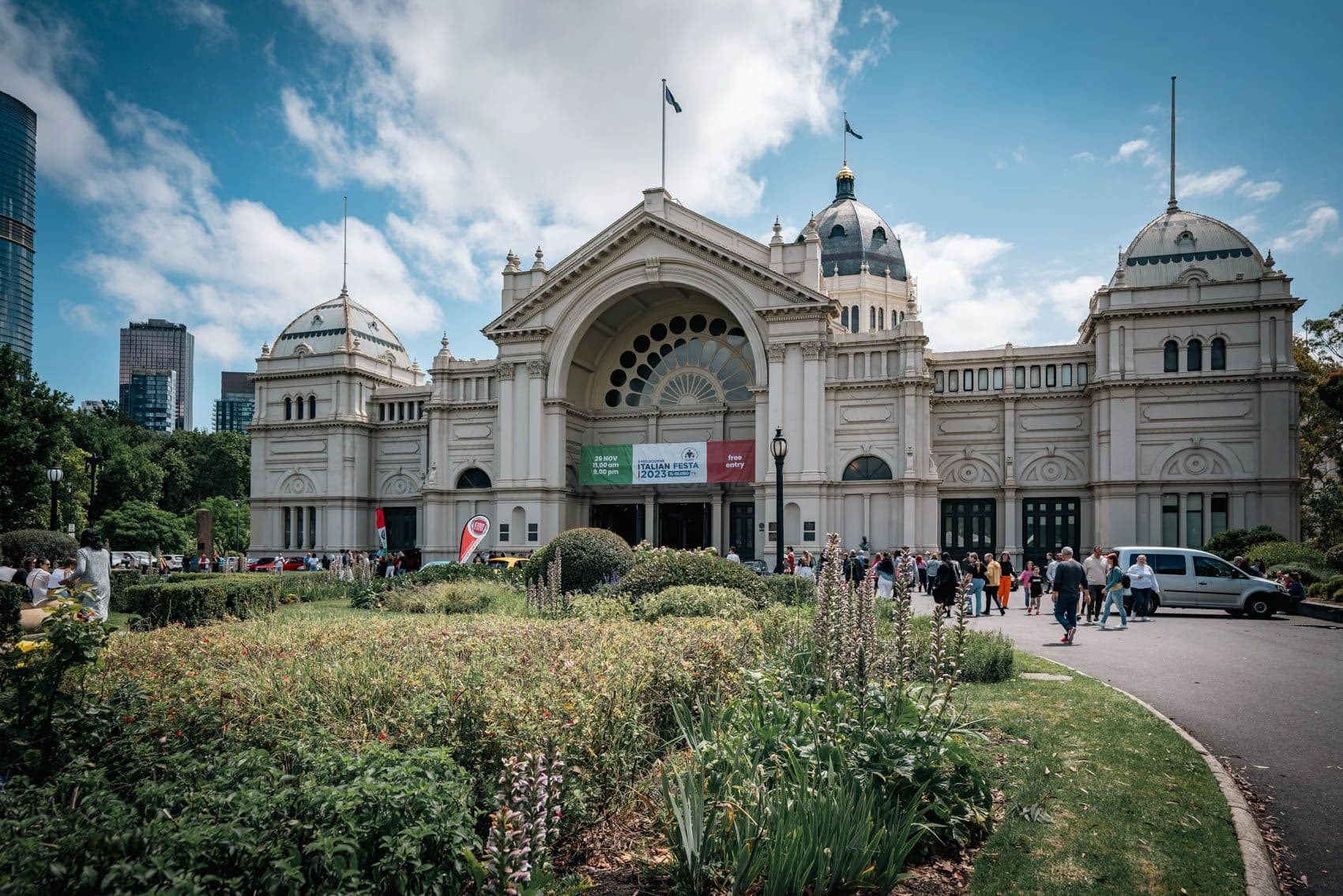 Royal Exhibition Building with Italian Festa 2023 banners and crowds gathering outside