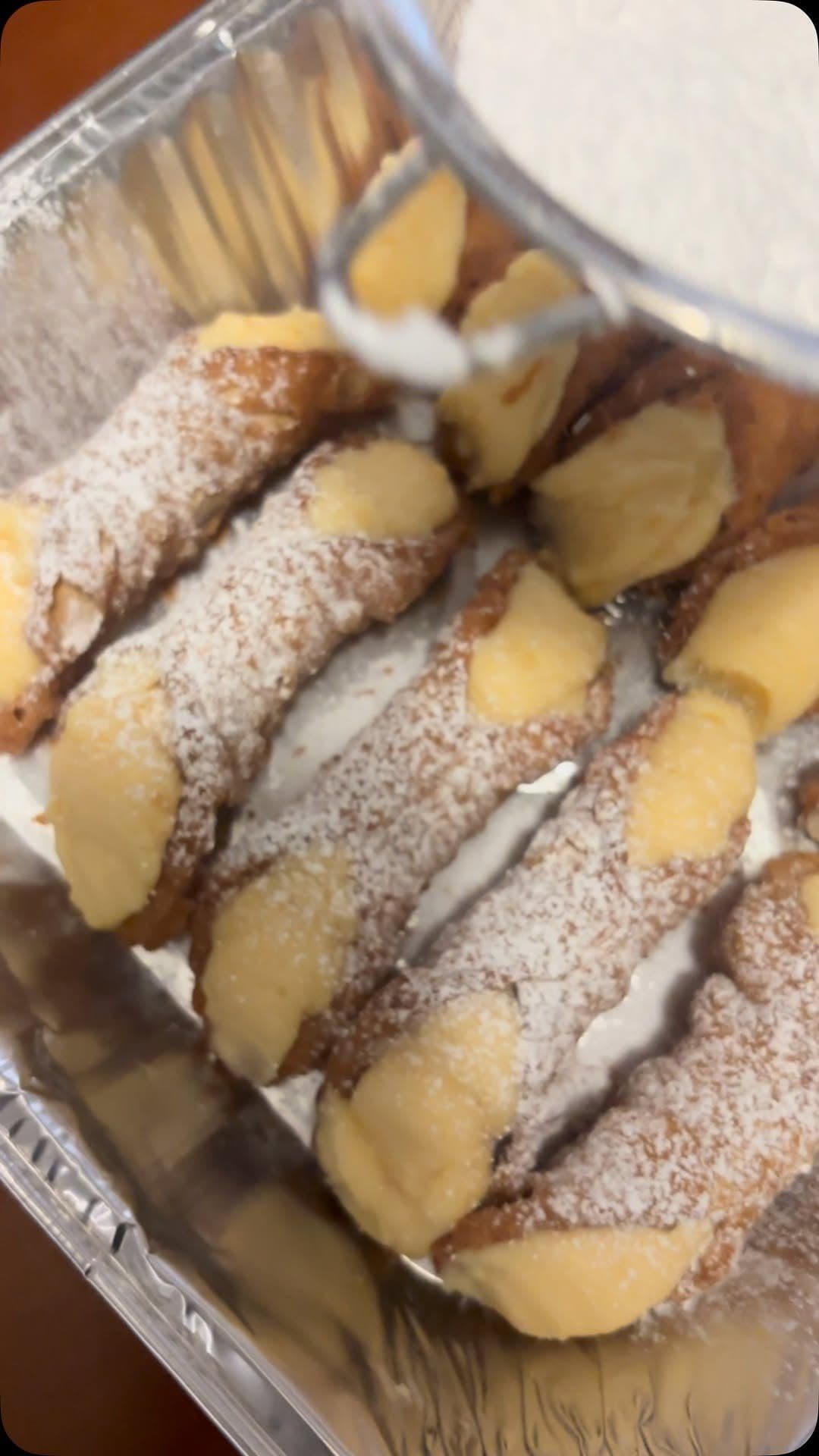 Cannoli dusted with icing sugar