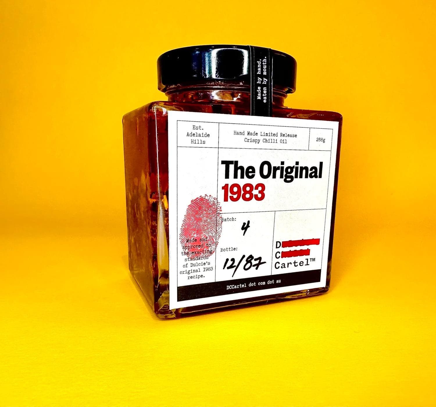 Jar of DC Cartel crispy chilli oil labeled The Original 1983