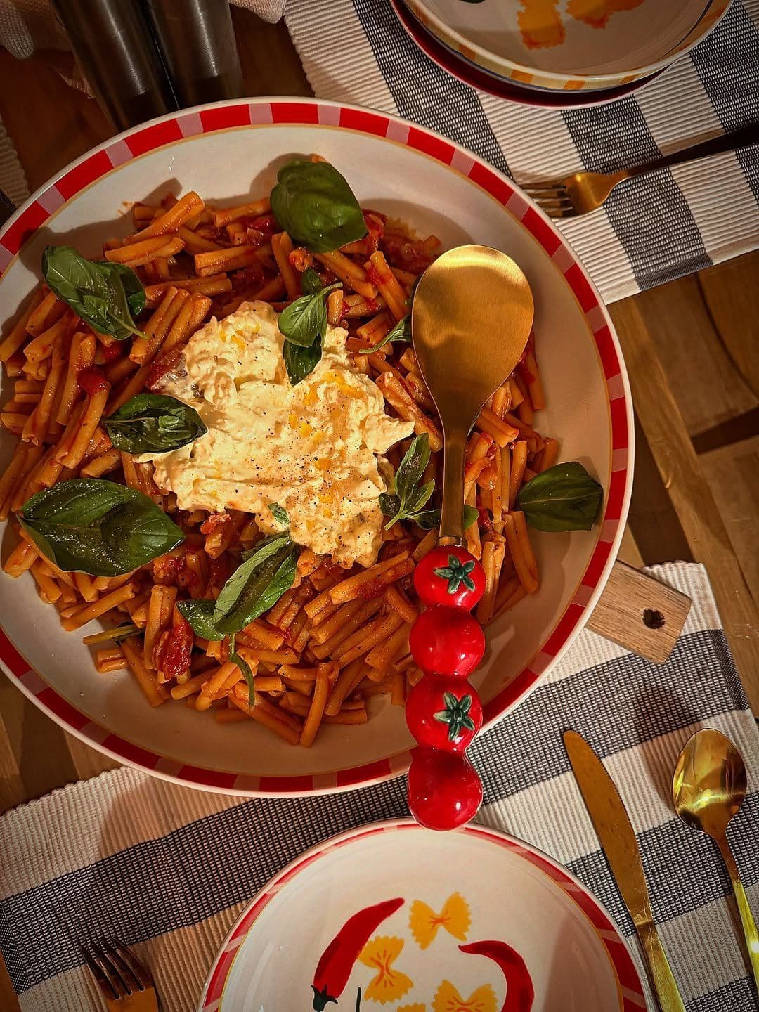 Plate of Island Pasta with tomato sauce and burrata