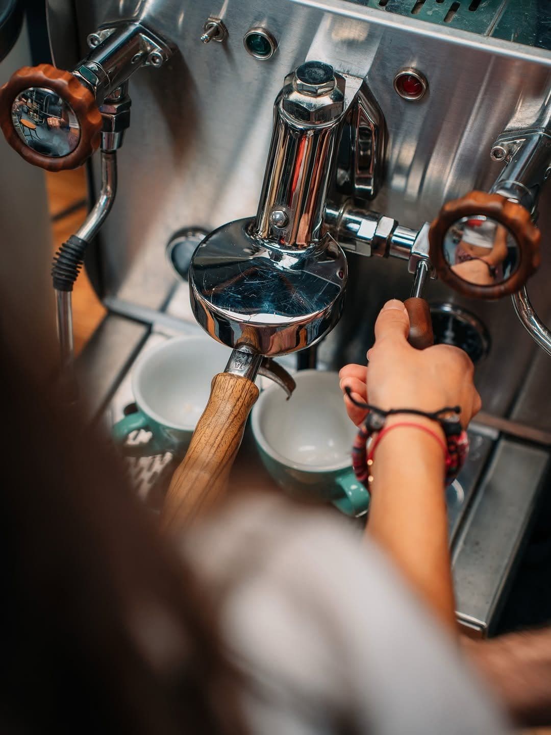 Espresso being pulled on a coffee machine