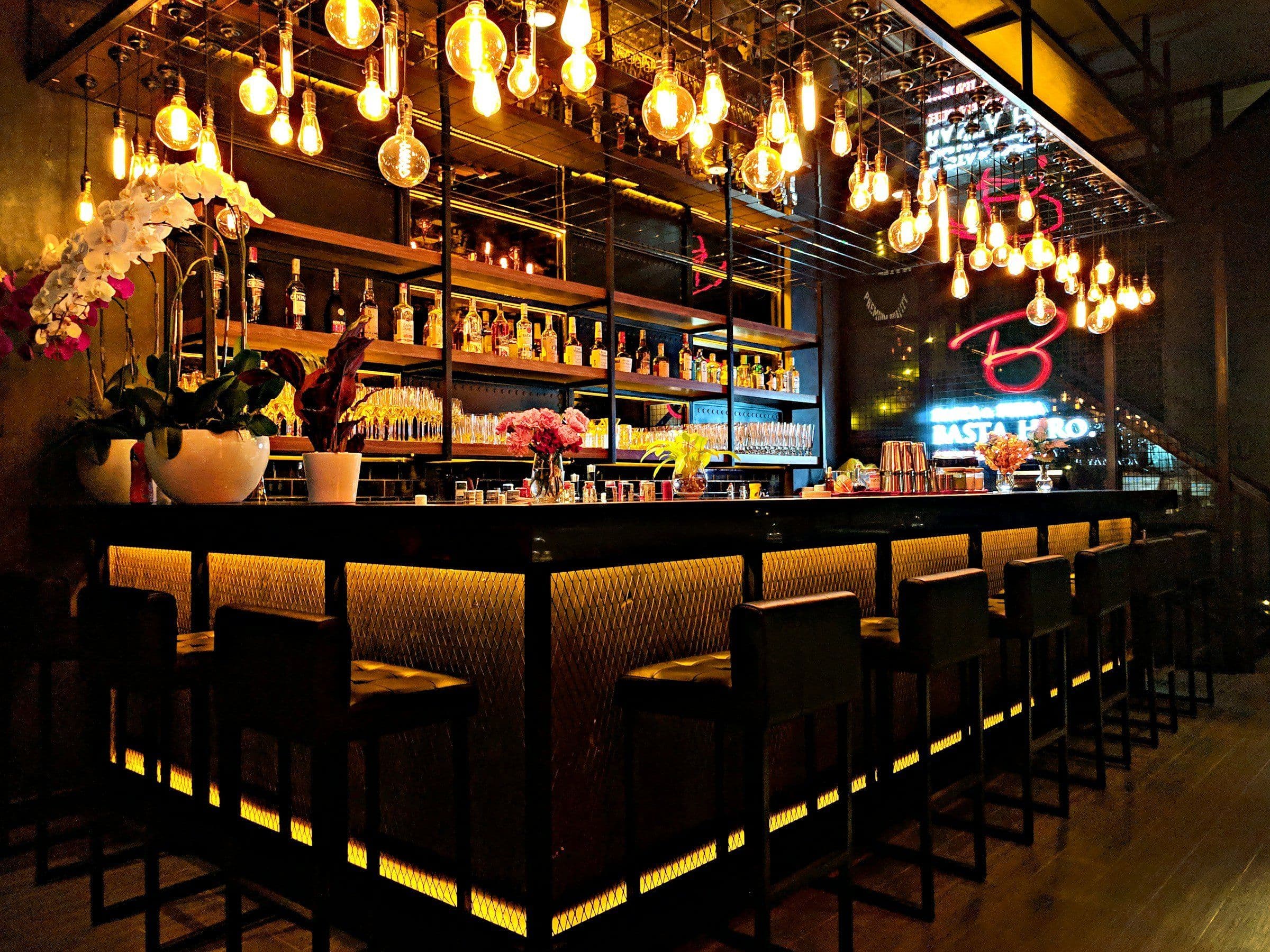 Cocktail bar with backlit bottles