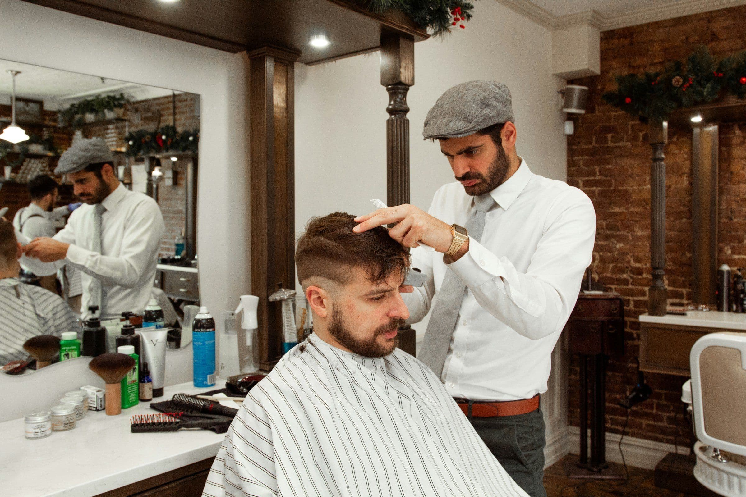 Barber giving a man a haircut