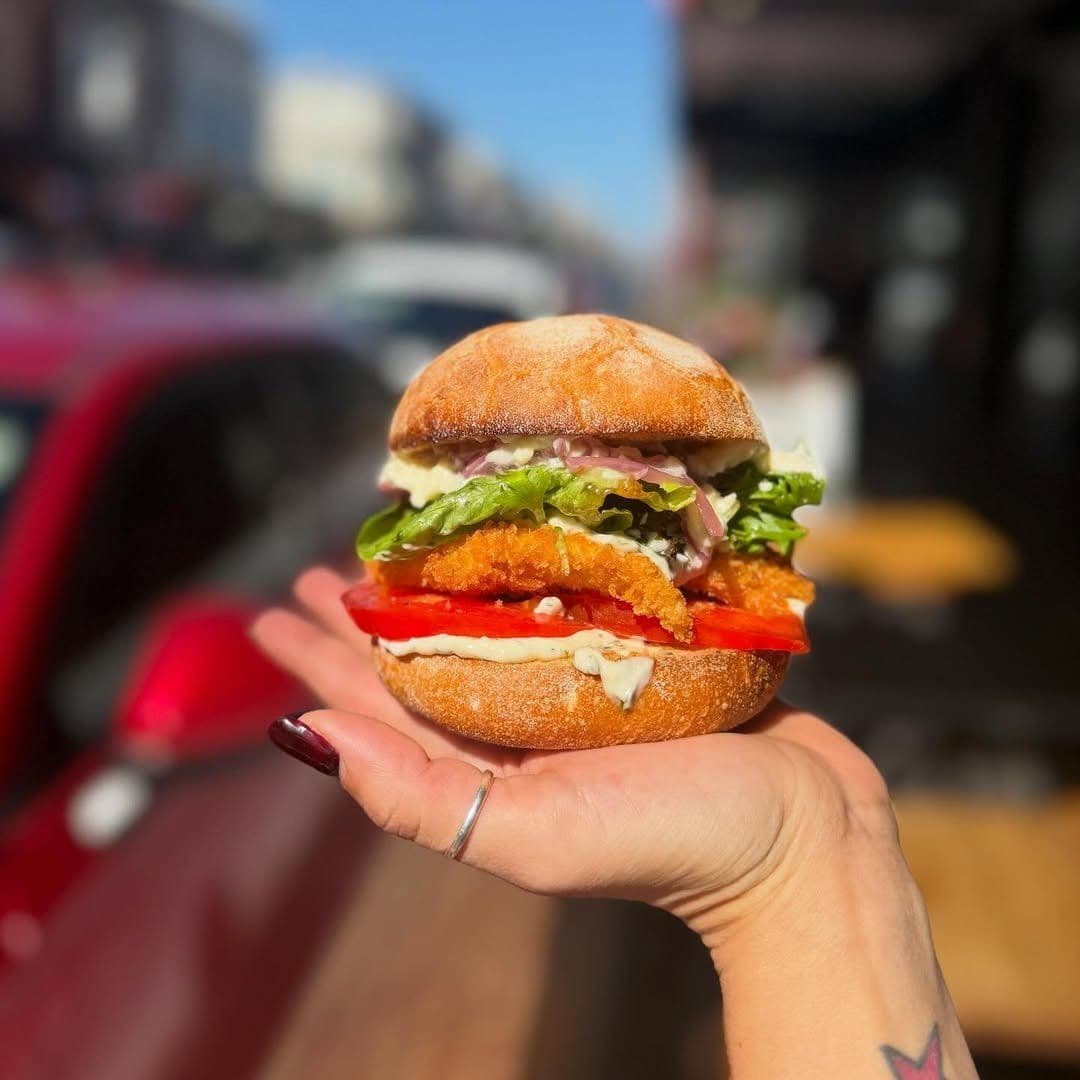 Seafood panino held in hand