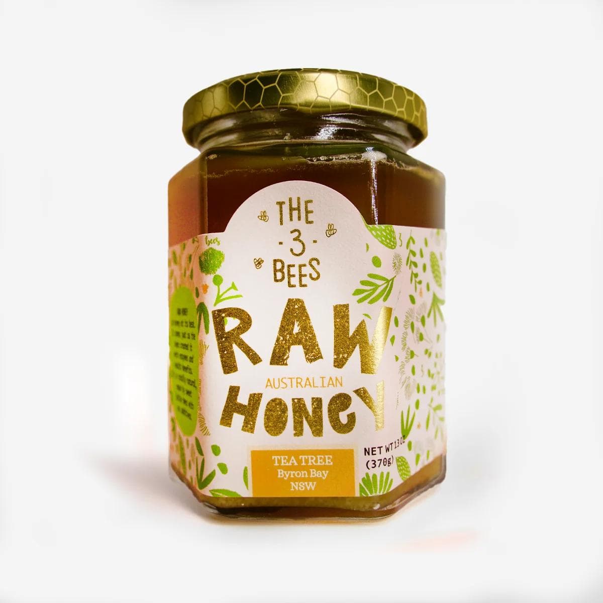Jar of The 3 Bees raw tea tree honey with gold lid