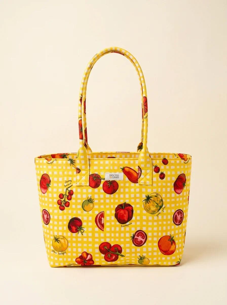 Yellow tomato-print tote bag with gingham pattern displayed