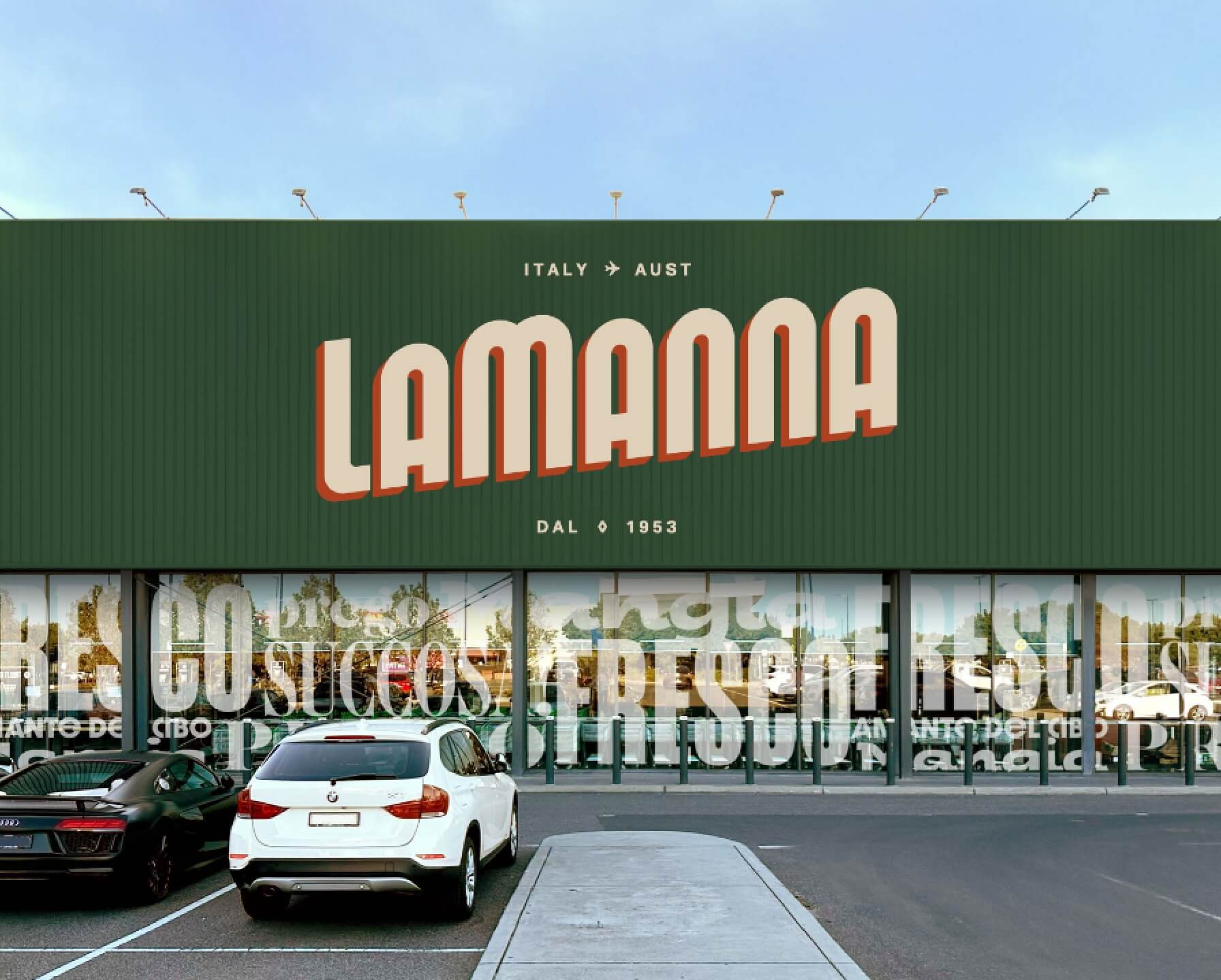 LaManna storefront building with green signage and parked cars